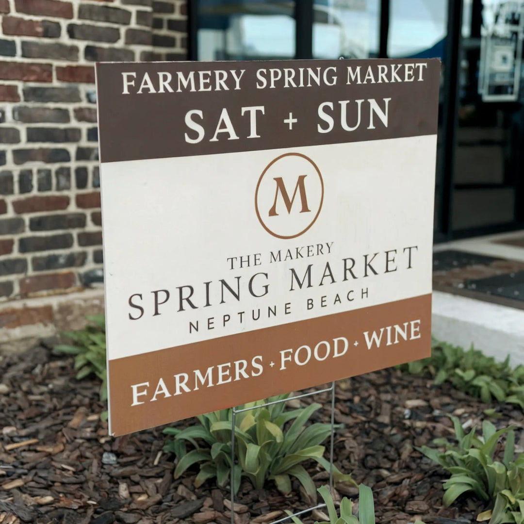 Custom yard sign for Makery Spring Market in Neptune Beach, outside brick building entrance