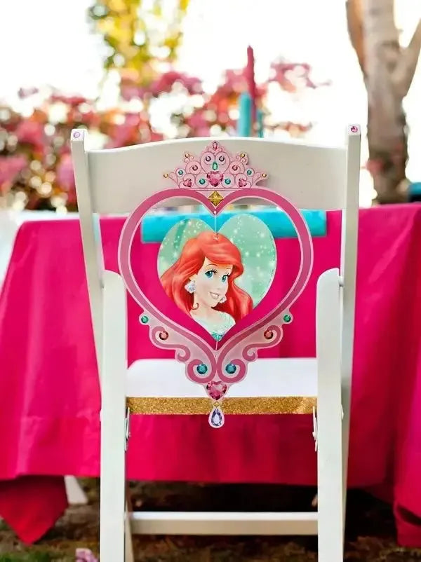 Disney Princess Ariel party chair decoration at outdoor pink-themed kids birthday