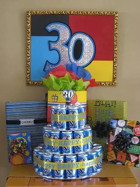 30th birthday party display with stacked beer cans, colorful gifts, and large '30' sign