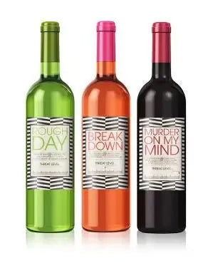 Three wine bottles with humorous labels: Rough Day, Break Down, and Murder On My Mind.