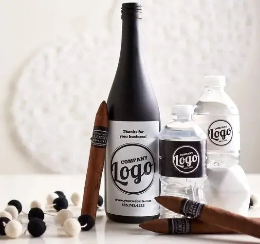 Custom business branding labels on wine bottle, water bottles, and cigars, white background