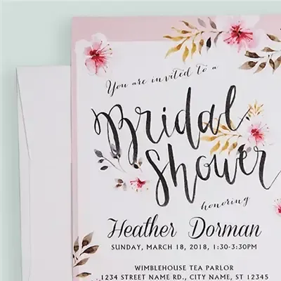 Floral bridal shower invitation template with pink and gold accents and elegant script text
