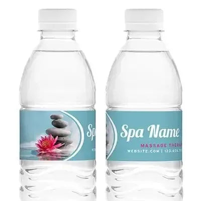 Custom spa water bottle labels with stacked stones and a pink lotus flower design