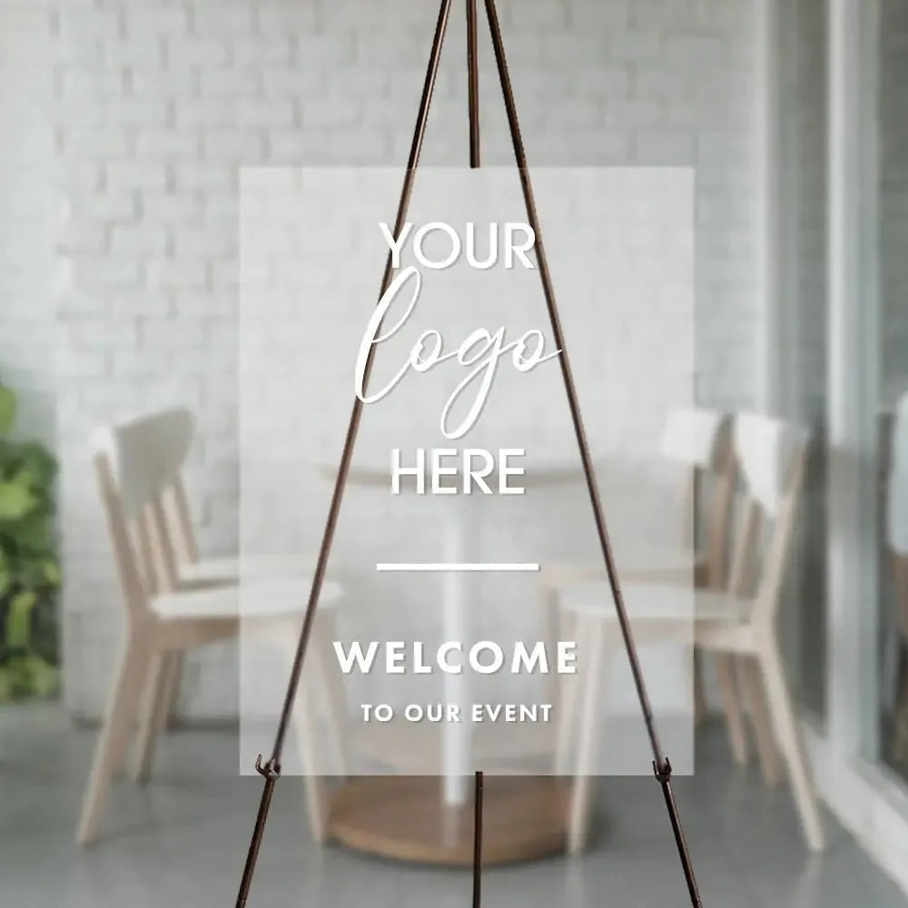 Custom business welcome sign on easel in a modern office setting, mockup with logo placeholder