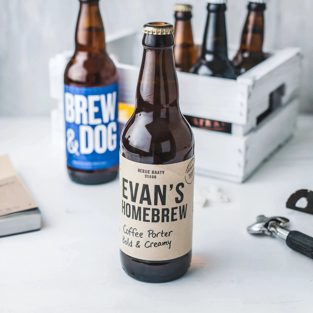Custom homebrew beer bottle with personalized label, coffee porter style, on white table