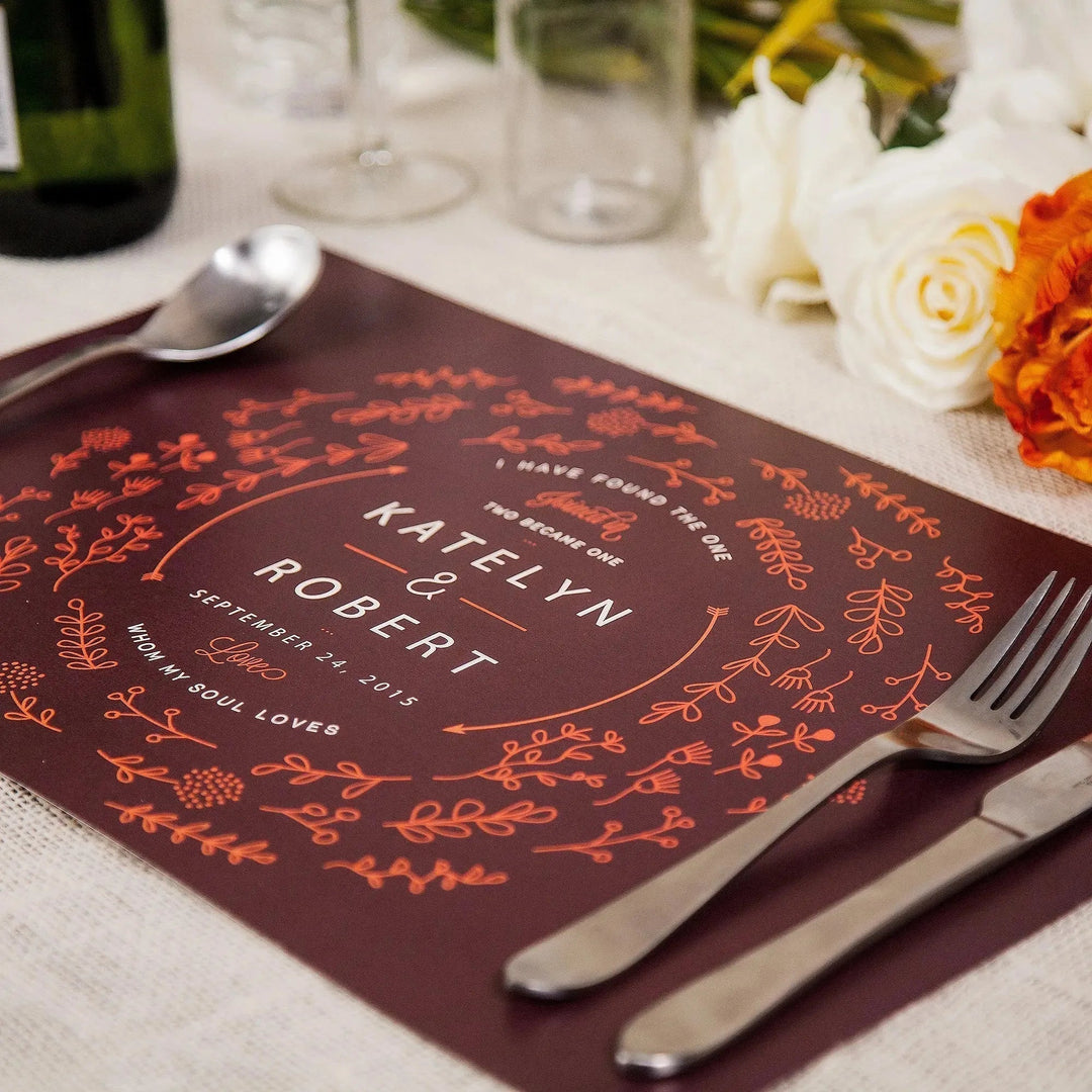 Custom personalized wedding placemat with floral design, table setting, and orange flowers