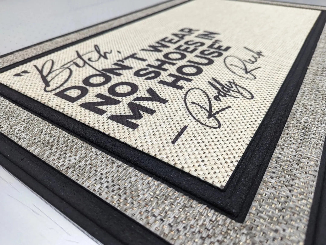 Personalized door mat with 'Don’t wear no shoes in my house' quote, neutral woven texture.