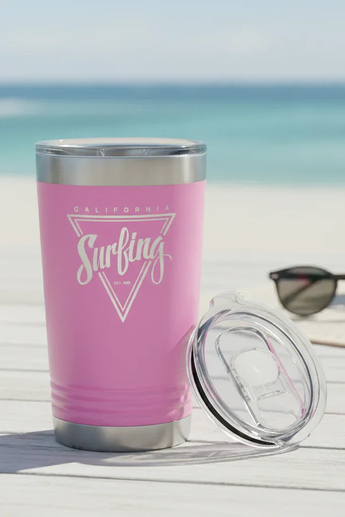 Light Purple tumbler with 'California Surfing' design on a beach setting