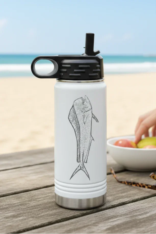 White water bottle with fish design on a wooden table by the beach