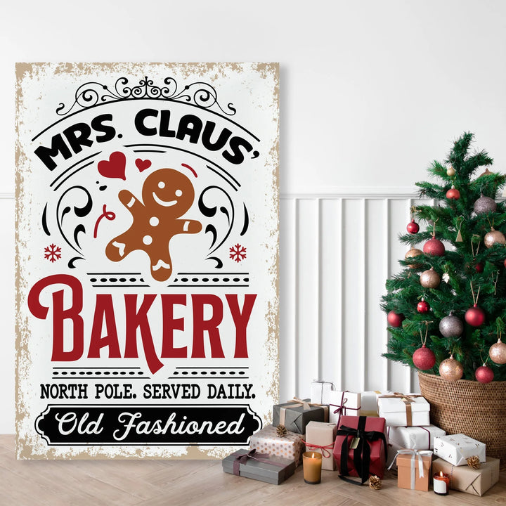 Mrs. Claus Bakery vintage metal sign with gingerbread man and Christmas decorations