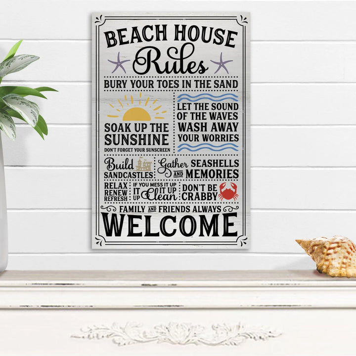 Beach house rules metal wall sign with sun, starfish, crab, sandcastle graphics in coastal home decor