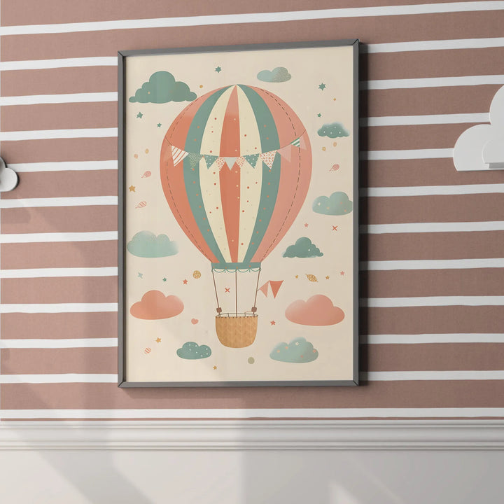 Framed colorful hot air balloon nursery poster with clouds and stars on striped wall