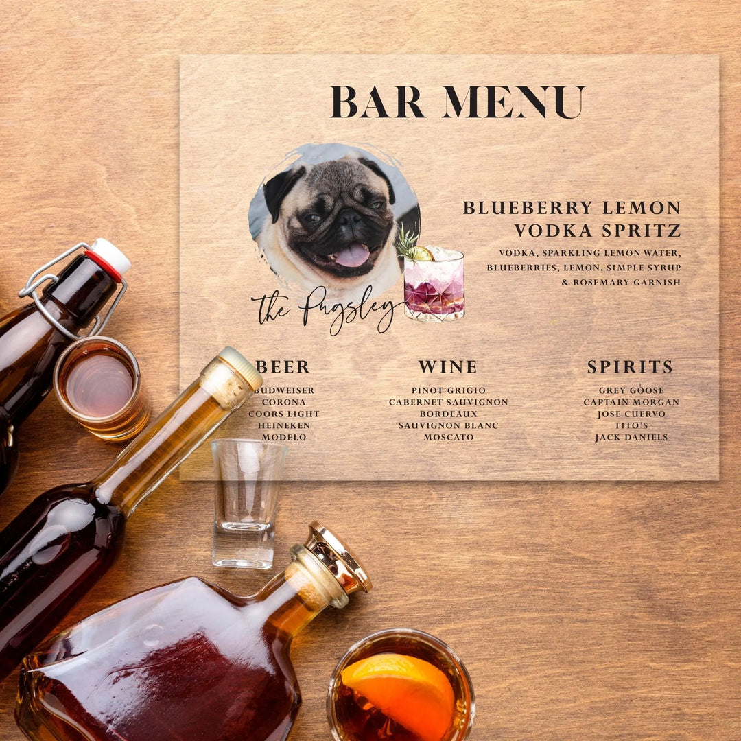 wooden bar menu with pug photo named The Pugsley, cocktails, beer, wine, spirits list, with liquor bottles and glasses