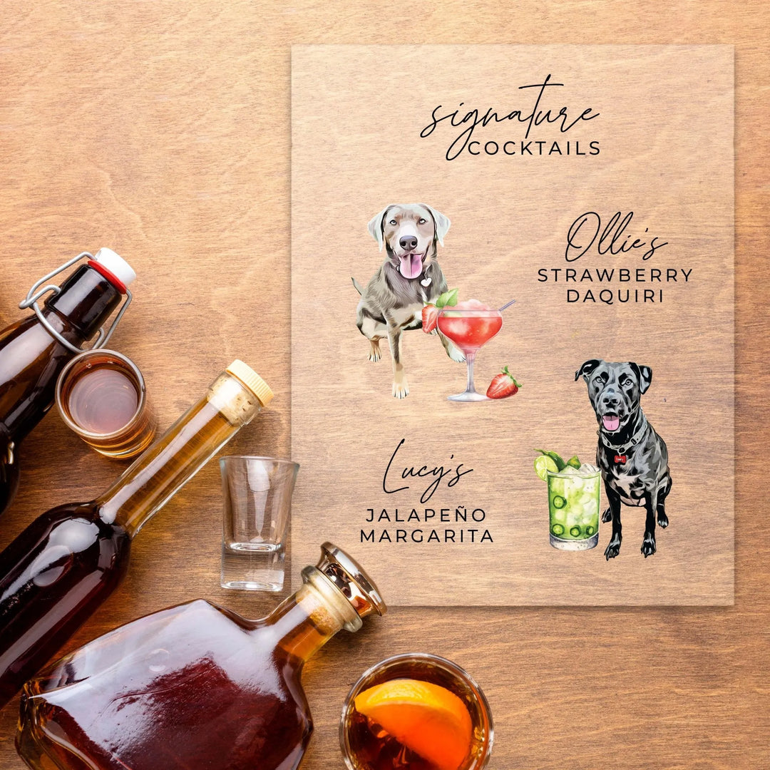 Wooden signature cocktail menu with dogs illustration and drinks: Ollie's strawberry daquiri, Lucy's jalapeño margarita