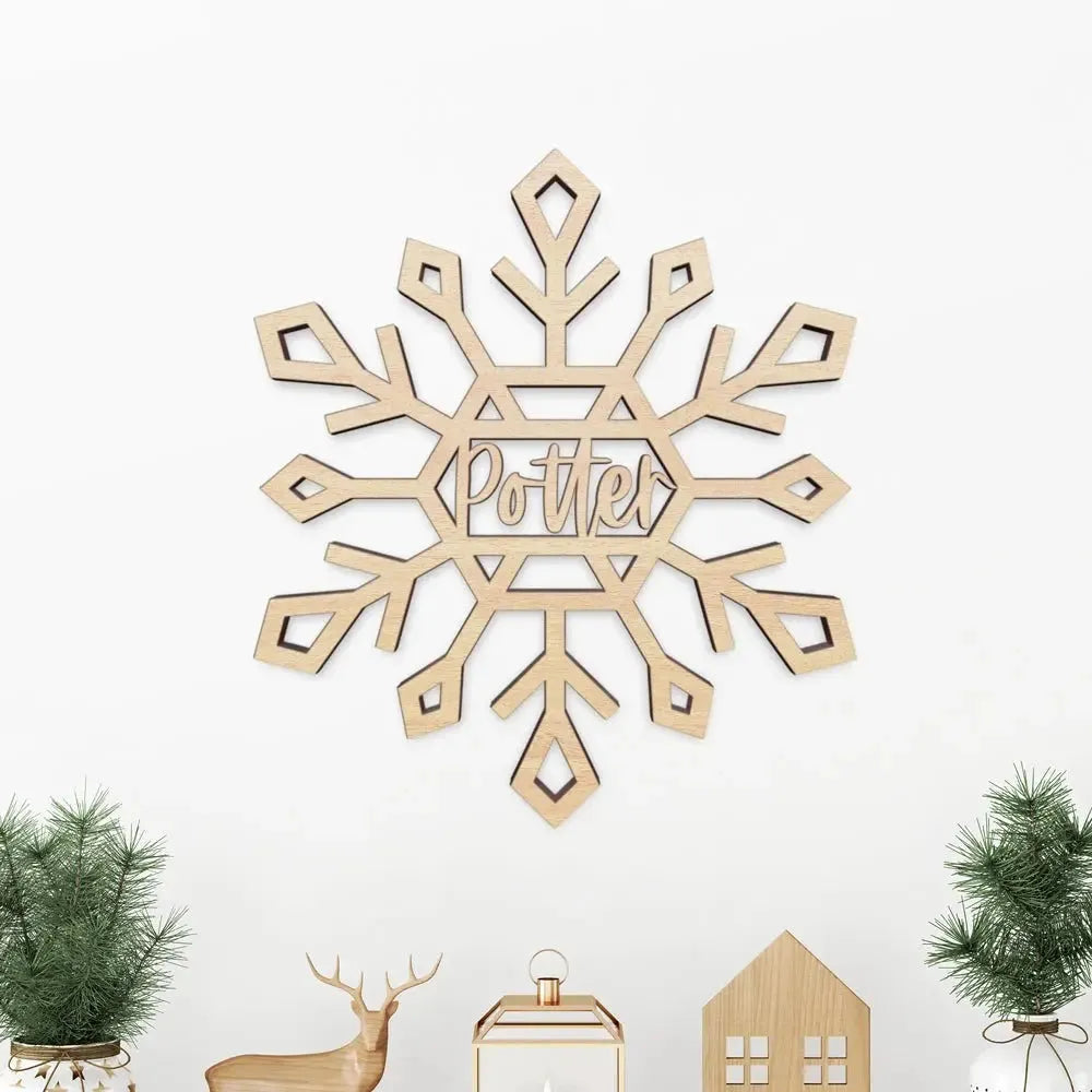 Personalized wooden snowflake wall sign with 'Potter' name, holiday decor, minimalist style