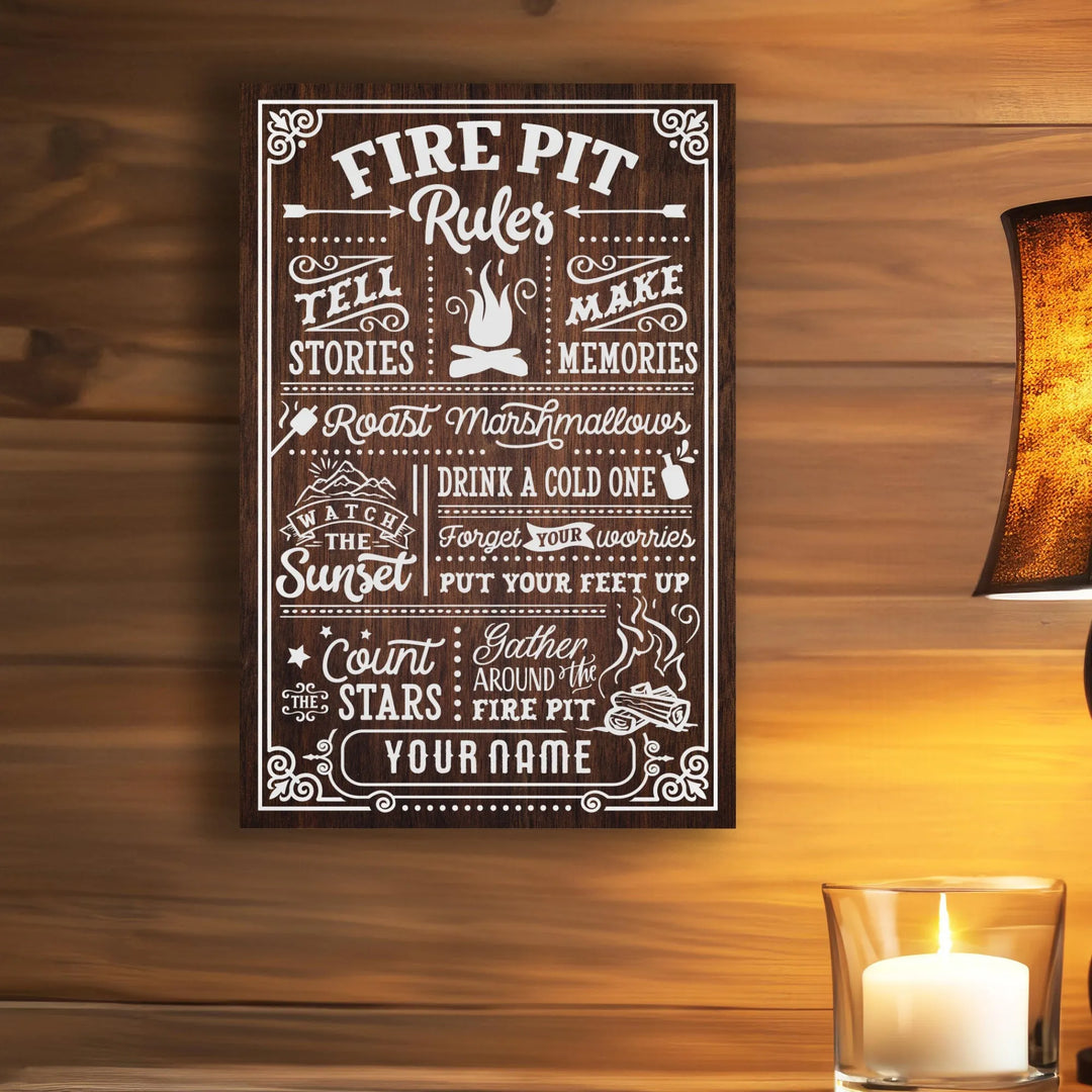 Wooden fire pit rules sign with white text and graphics, candle and warm wall lighting