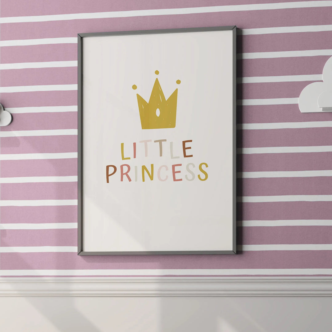 Framed nursery wall art with gold crown and colorful 'Little Princess' text on pink striped wall