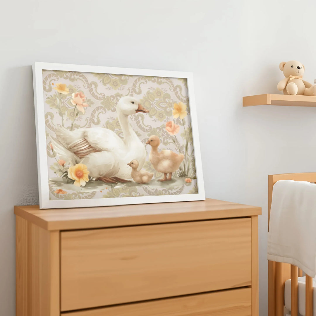Watercolor nursery wall art of a white mama goose with two ducklings and flowers on dresser