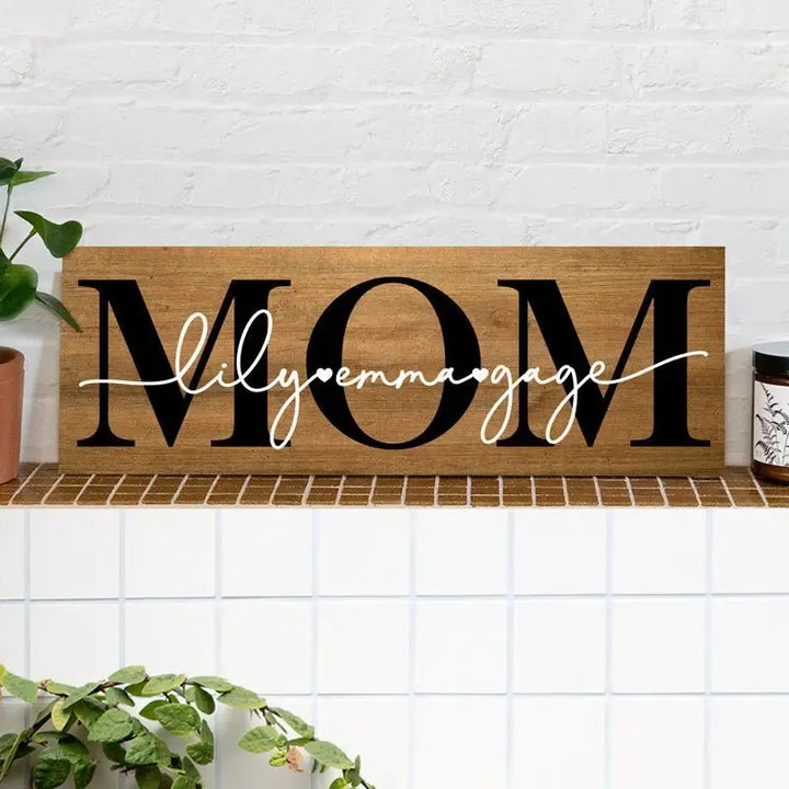 Personalized wooden MOM sign with custom names on a tile shelf, perfect Mother's Day gift