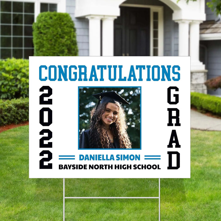 Graduation yard sign with photo of graduate Daniella Simon, congratulating 2022 grad from Bayside North High School