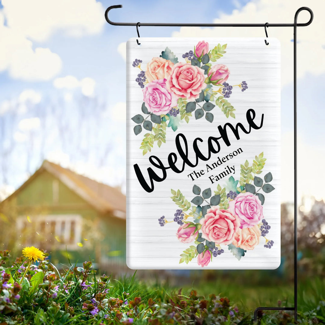 Personalized garden flag with pink and peach roses and welcome message for The Anderson Family