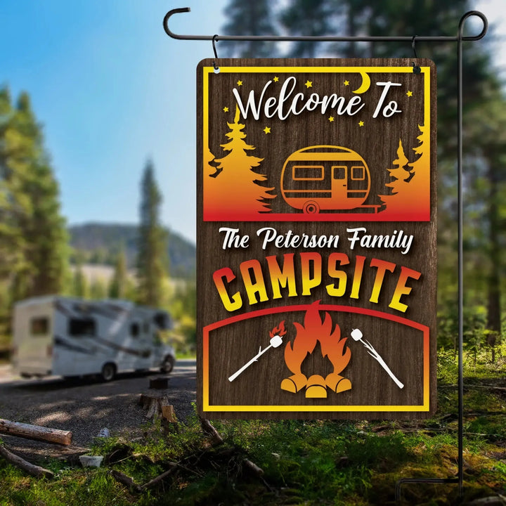 Personalized metal garden flag reading Welcome to The Peterson Family Campsite with RV, campfire, and marshmallows design