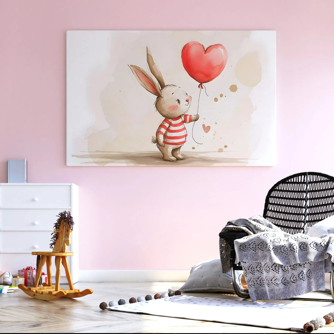 Nursery room with pink walls featuring cute bunny wall art holding red heart balloon, wooden rocking horse, cozy chair with throws