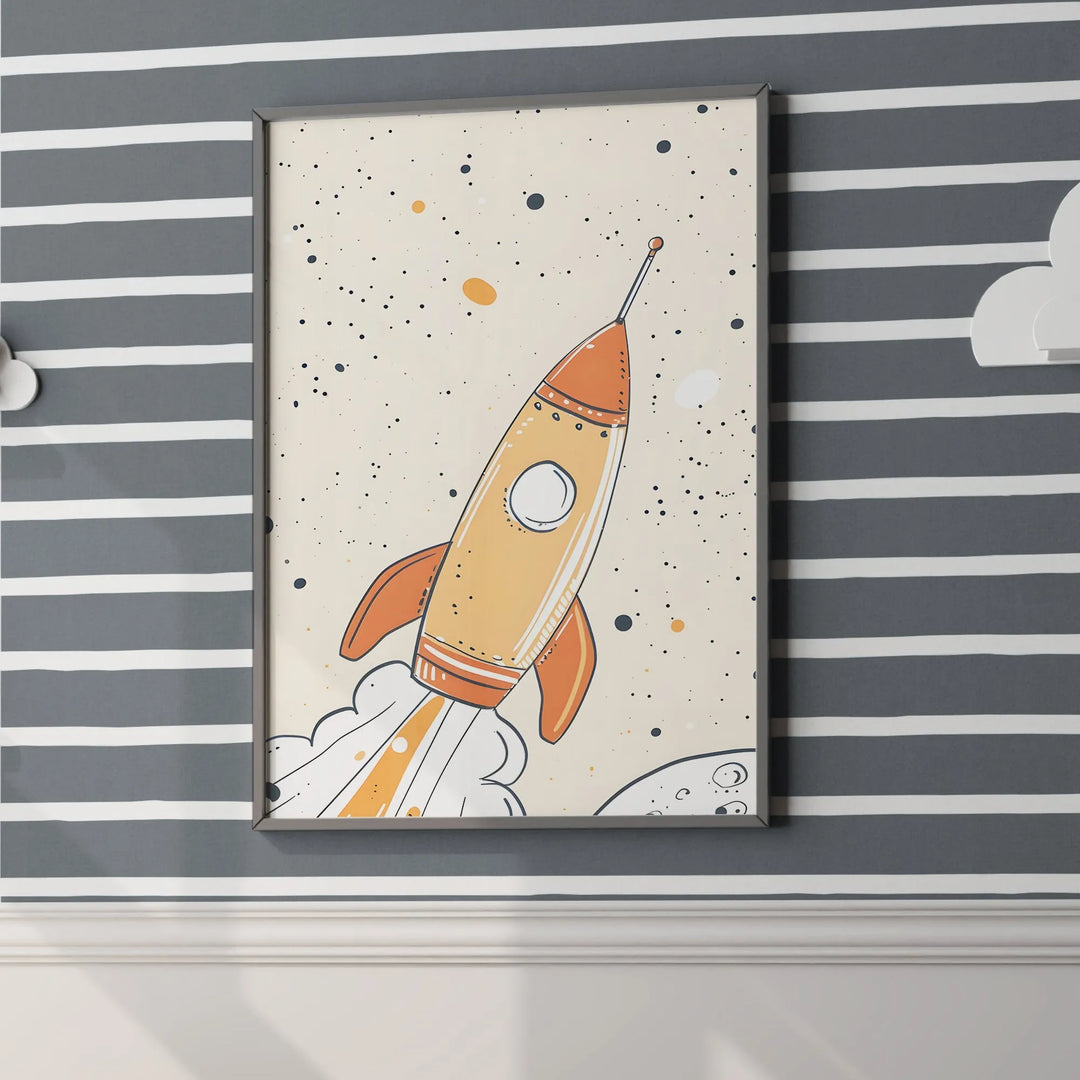 Framed rocket ship nursery wall art with orange and beige spaceship on gray striped wall