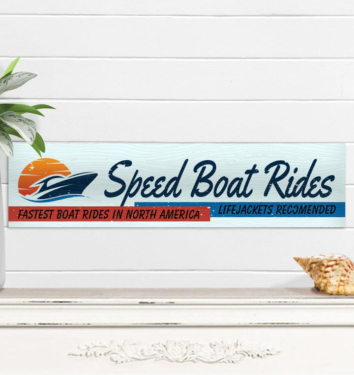 Metal sign advertising speed boat rides with sunset and boat graphic, recommending lifejackets