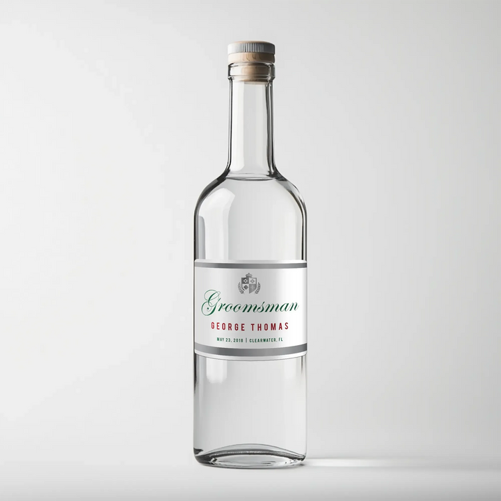 Personalized Tanqueray gin bottle with custom groomsman label on white background