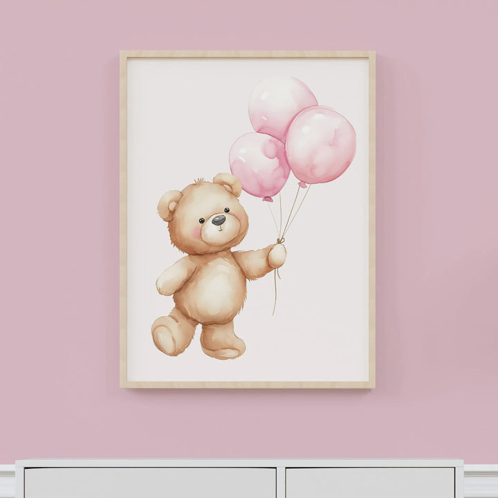 Nursery wall art of a cute teddy bear holding three pink balloons in a wooden frame