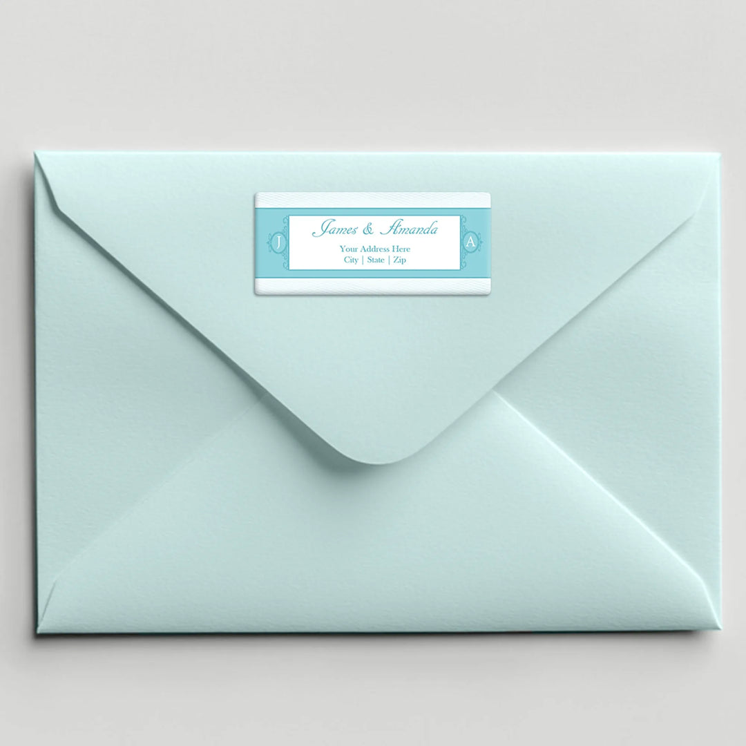 Turquoise address label on light blue envelope, personalized wedding stationery