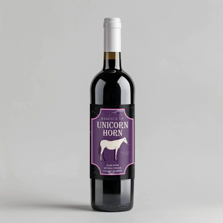 Unicorn wine bottle with purple label featuring white unicorn illustration and text