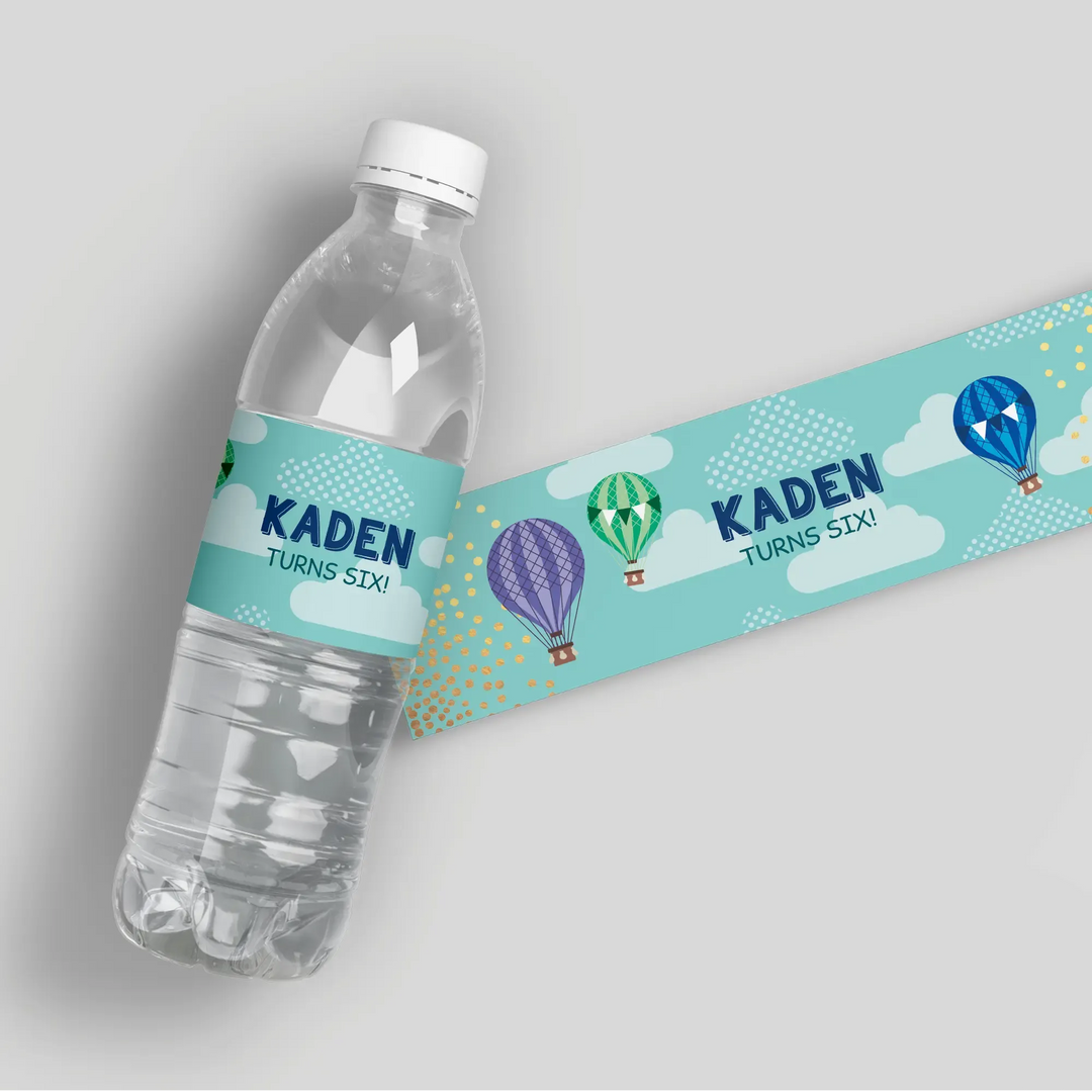 Hot air balloon themed water bottle label for birthday, text reads 'Kaden turns six!'