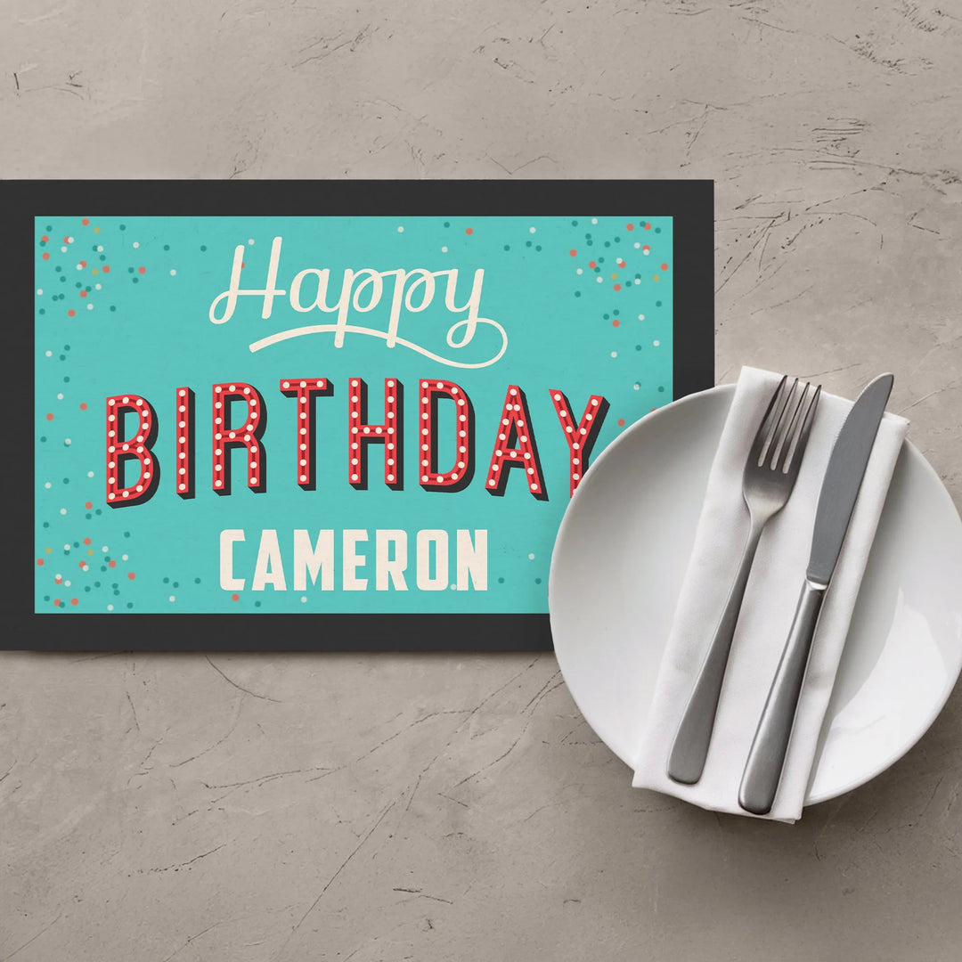 Vintage birthday placemat with retro lights, turquoise background, plate and cutlery
