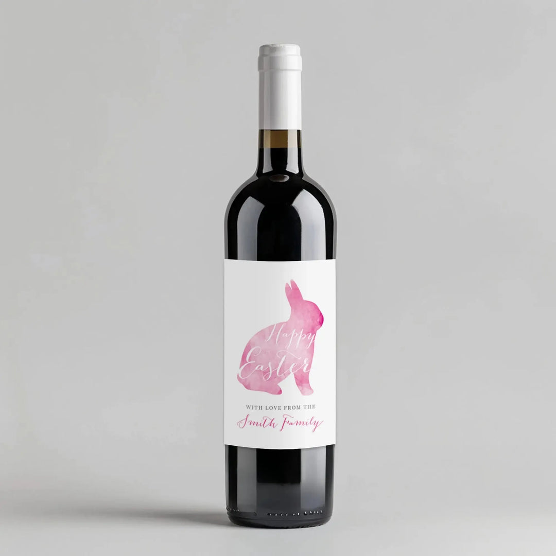 Wine bottle with watercolor bunny and Happy Easter label on white background