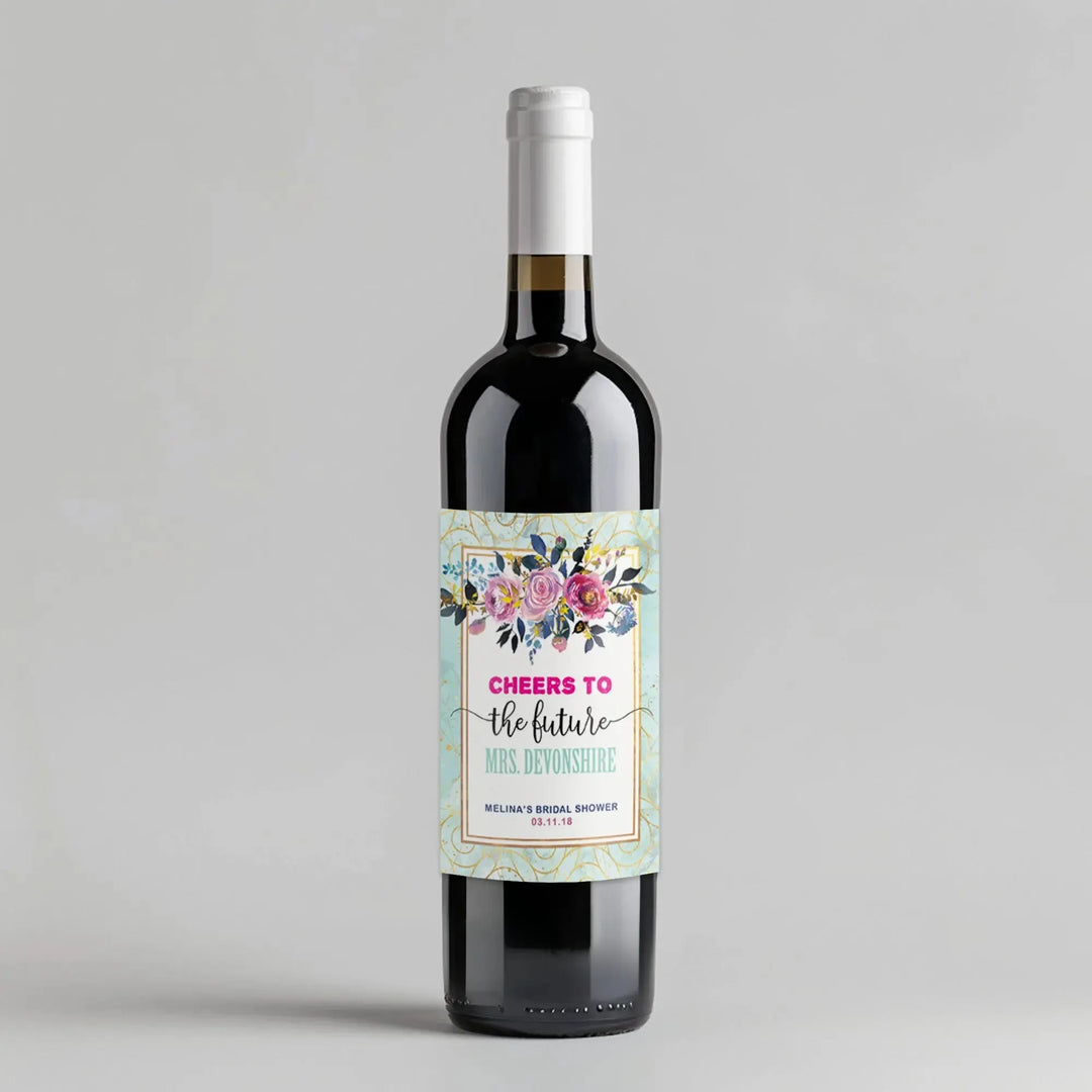 Wine bottle with watercolor roses bridal shower label and floral design on light background.