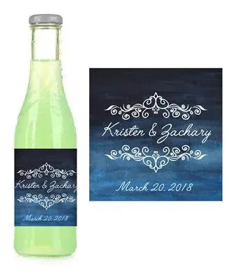 Custom watercolor script soda label on bottle, navy blue gradient, decorative white text.