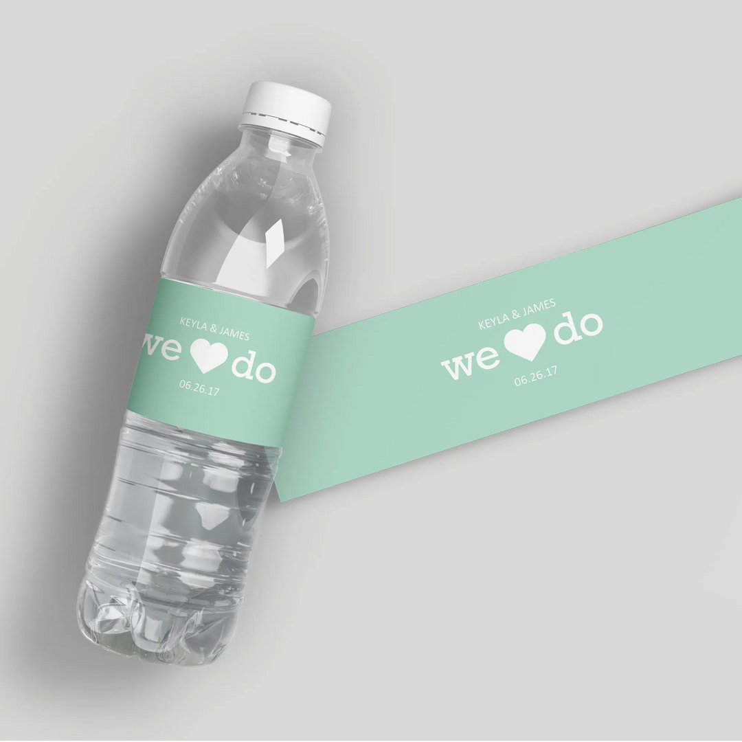 Custom mint green wedding water bottle label with white text and heart design