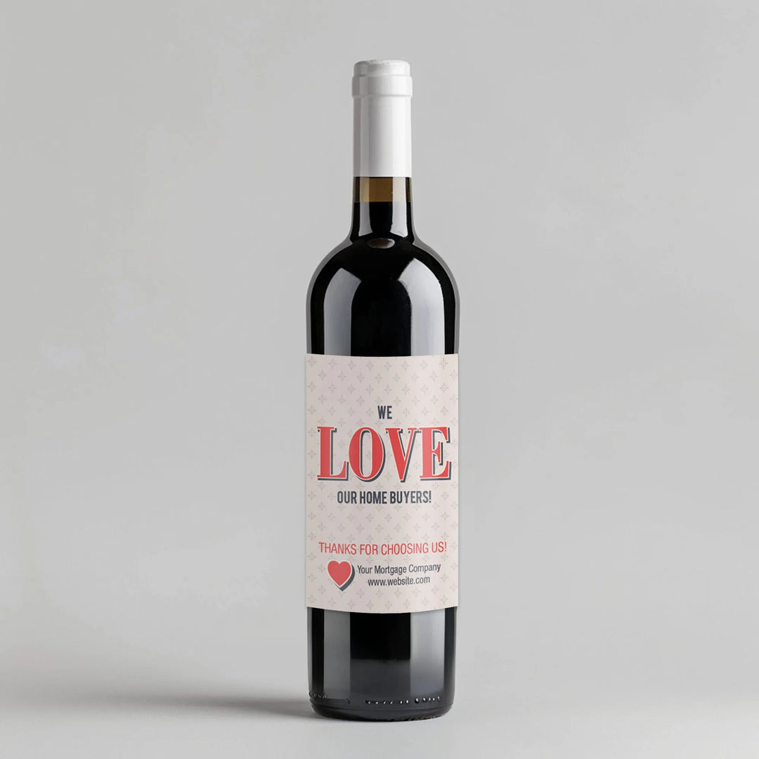 Wine bottle with 'We Love Our Home Buyers' custom mortgage broker label