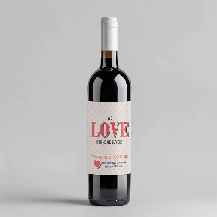 Wine bottle with 'We Love Our Home Buyers' custom mortgage broker label