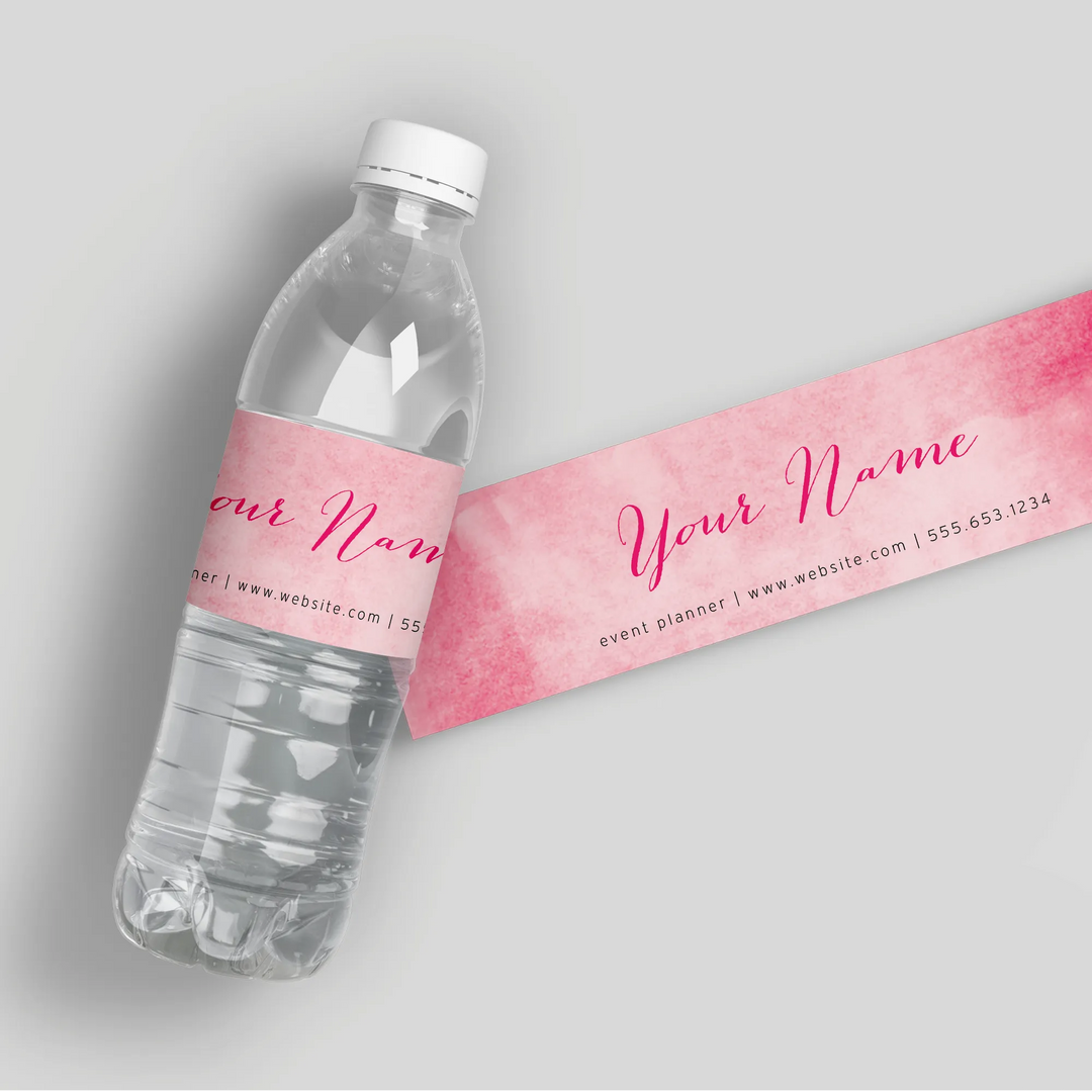 Water bottle with pink watercolor custom event planner label template on gray background