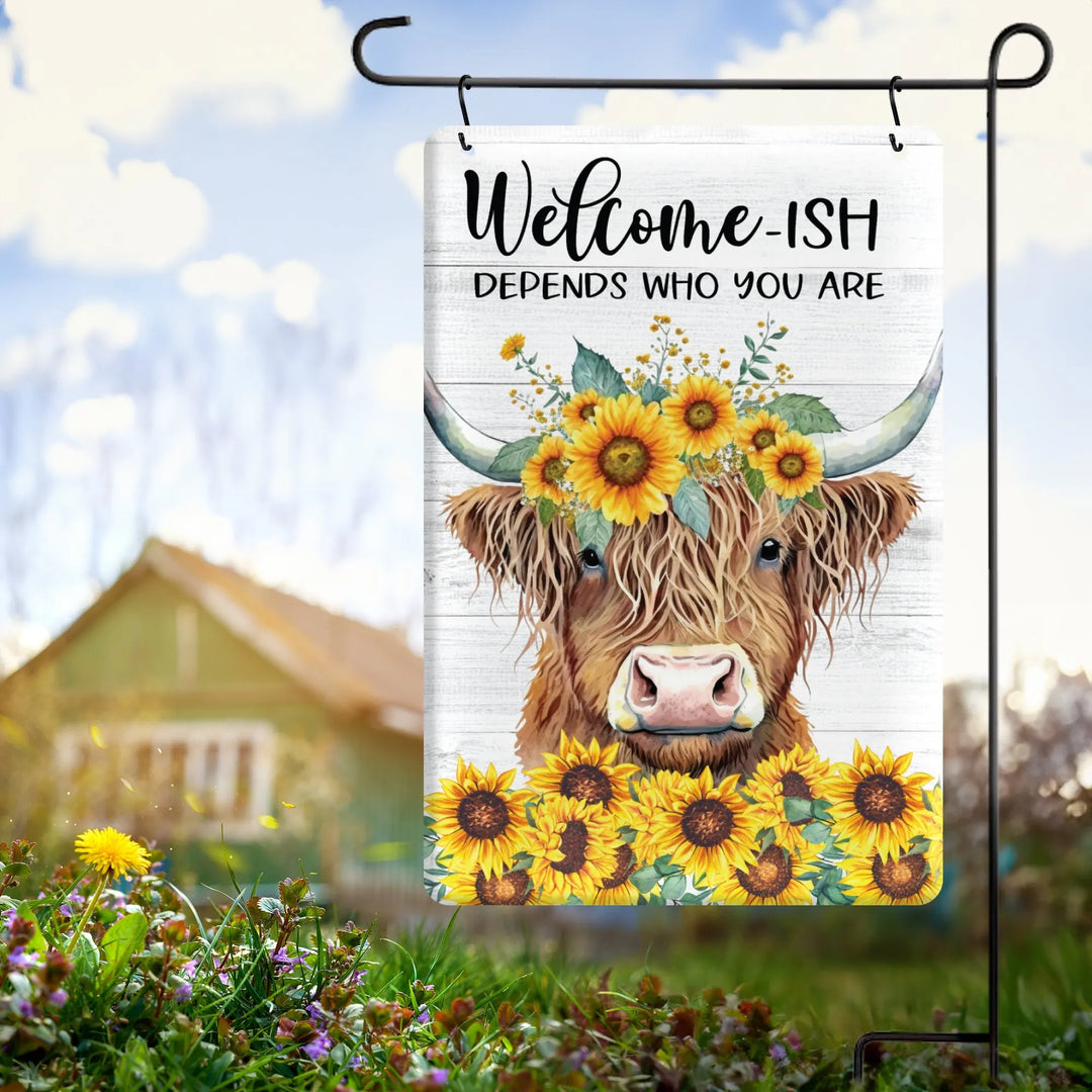 Garden flag with highland cow wearing sunflower crown and text 'Welcome-ish depends who you are' on white wood