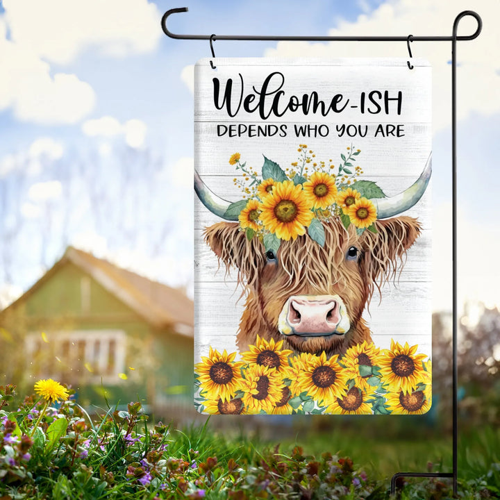 Garden flag with highland cow wearing sunflower crown and text 'Welcome-ish depends who you are' on white wood
