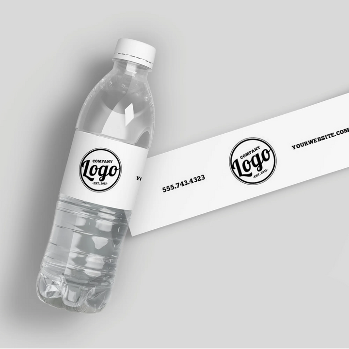 Custom white business water bottle label with company logo, phone, and website on a clear bottle