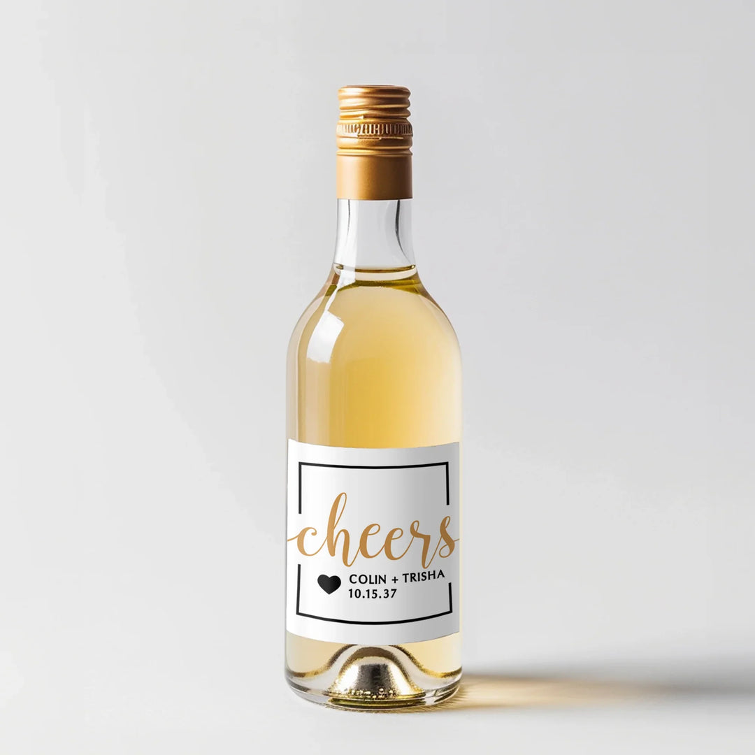 Mini white wine bottle with gold cheers wedding label and gold cap