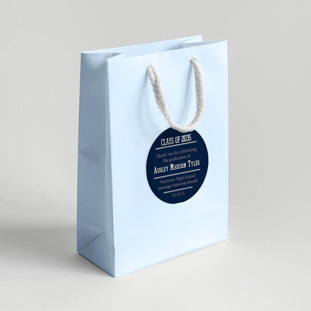 Light blue graduation favor bag with custom class of 2035 label and white rope handle